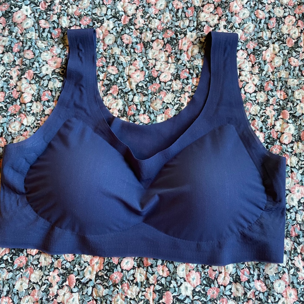 Lighter than air bras, 2 pack. Never worn. Blue and sea foam green.